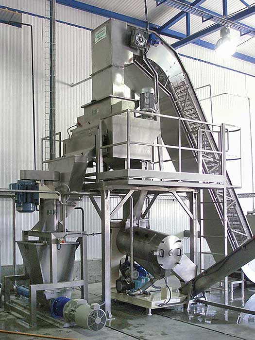 Fruit pitting machines